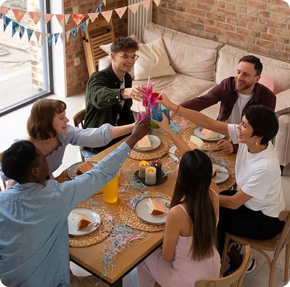 A family and friends sharing a meal at home